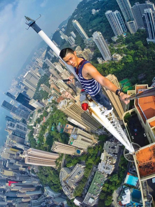 Camera in hand, the city is the backdrop